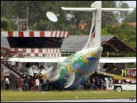A Bangkok Airways plane is seen after it skidded off the runway while attempting to land on Samui island, Thailand, Tuesday